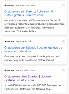 Copie d'écran de la nouvelle mise en page des résultats publicitaires sur la page des résultats de recherche Google.